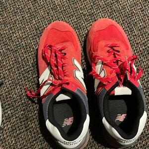 New Balance 574’s, size 12D, great condition.